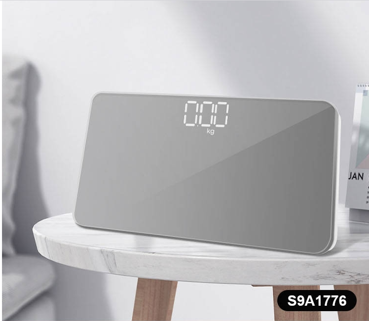 Portable weighing scale with cosmetic mirror